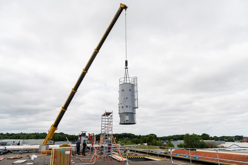 Close-up of the e-boiler suspended by the crane during installation.
Caption: A heavy-lift crane positions Aviko's new fully electric e-boiler at the Lomm production facility, where the renewable electricity-powered system will replace part of the site's natural gas-based steam generation. Close-up of the e-boiler suspended by the crane during installation.
Caption: A heavy-lift crane positions Aviko's new fully electric e-boiler at the Lomm production facility, where the renewable electricity-powered system will replace part of the site's natural gas-based steam generation.