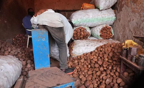 A mini shop for potatoes in Kigali, Rwanda A mini shop for potatoes in Kigali, Rwanda