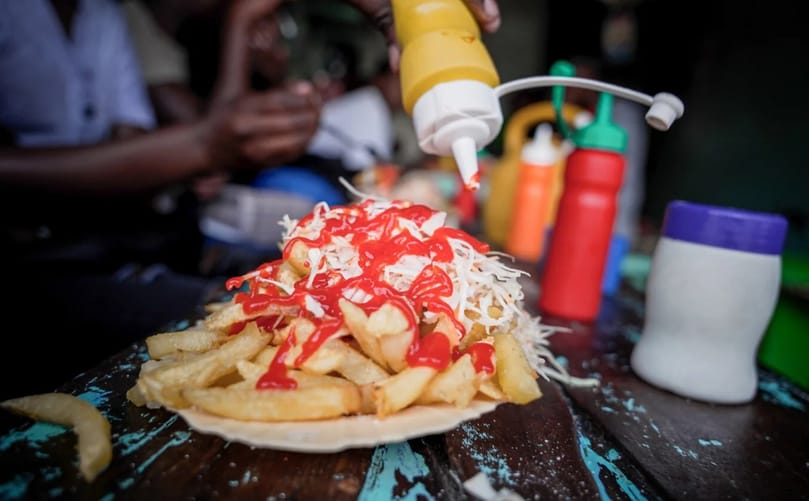 A plate of chips served with coleslaw at a food stall in Nakuru, Kenya. Fried potatoes are one of the country’s most popular street foods. (Courtesy: Kreis Visual Storytelling) A plate of chips served with coleslaw at a food stall in Nakuru, Kenya. Fried potatoes are one of the country’s most popular street foods. (Courtesy: Kreis Visual Storytelling)