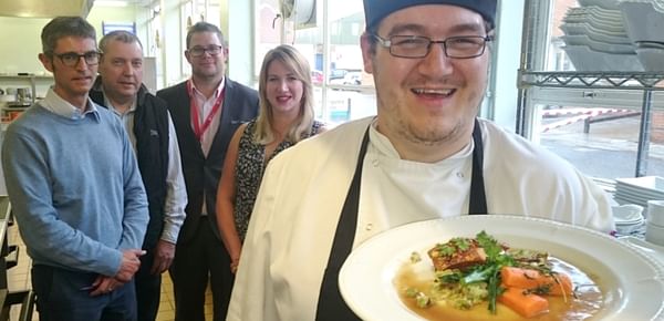 Frazer Coulby (Harrogate College student) with his winning dish, bubble and squeak with belly pork