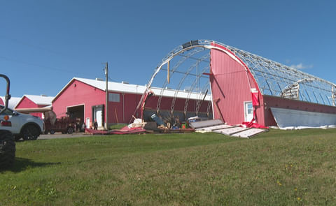 Alex Docherty of Sky View Farms in Elmwood, P.E.I., said a tarp barn at his farm was completely destroyed and another was severely damaged. Alex Docherty of Sky View Farms in Elmwood, P.E.I., said a tarp barn at his farm was completely destroyed and another was severely damaged.