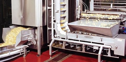 Heat and Control's heated centrifuge to lower oil content of potato chips