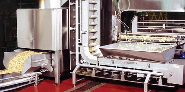 Heat and Control's heated centrifuge to lower oil content of potato chips
