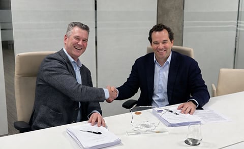 Maarten van Delst, CEO of Aviko, and Daniel de la Pedraja Yllera, Owner of Eurofrits, shake hands during the signing ceremony formalizing the acquisition agreement Maarten van Delst, CEO of Aviko, and Daniel de la Pedraja Yllera, Owner of Eurofrits, shake hands during the signing ceremony formalizing the acquisition agreement