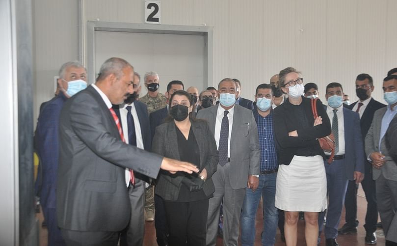 The warehouse manager explains the storage control system to an audience including the Kurdistan Minister of Agriculture, Representation of the Dutch Embassy and BEPPCO CEO , Mr. Shaban.