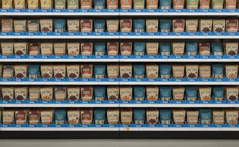 Retail-ready snack packaging on store shelves reflects BPA’s 2026 secondary packaging trends, including recyclable cartons, shelf-ready formats, and increased automation. Retail-ready snack packaging on store shelves reflects BPA’s 2026 secondary packaging trends, including recyclable cartons, shelf-ready formats, and increased automation.