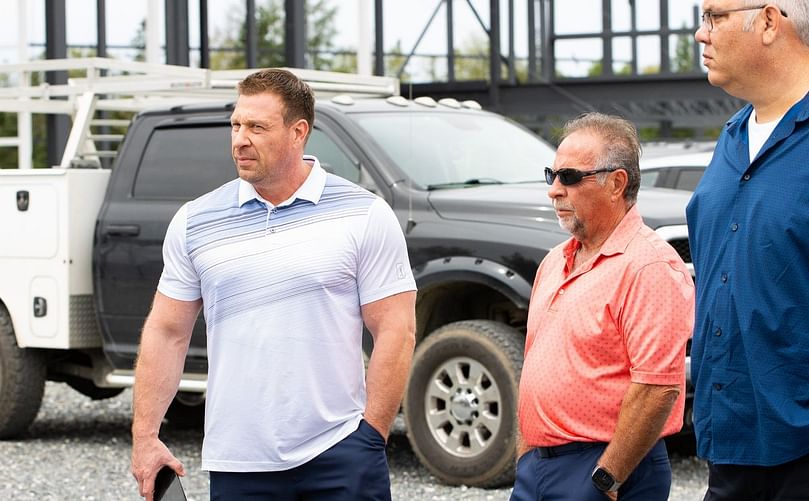 Brad Sargent (left) and Bruce Sargent (center) look on during a speech at the construction site for the future Taste of Maine Potato Chip Co. plant Wednesday. (Courtesy: The Country) Brad Sargent (left) and Bruce Sargent (center) look on during a speech at the construction site for the future Taste of Maine Potato Chip Co. plant Wednesday. (Courtesy: The Country)