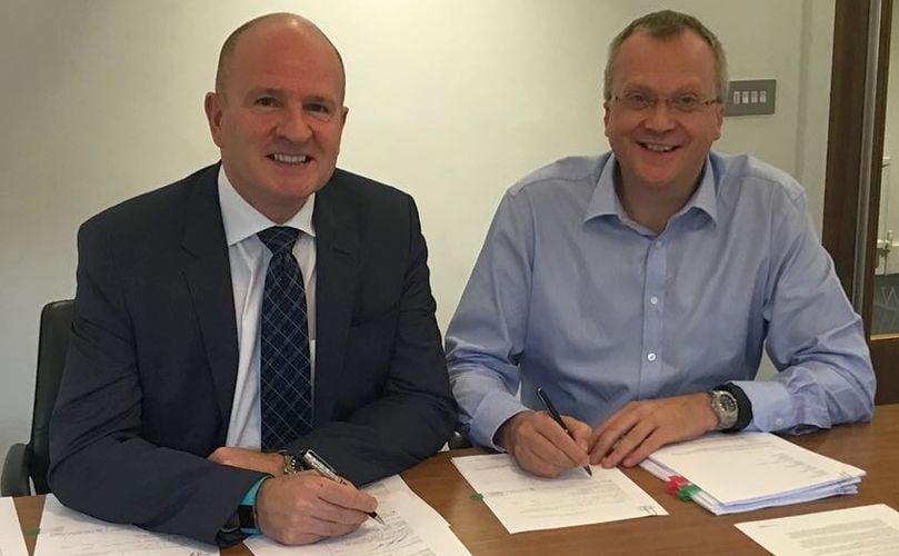 Richard Robinson, MD of Calbee UK (left) and Jonathan Bye, Chief Executive of Seabrook (right) signing the deal. Richard Robinson, MD of Calbee UK (left) and Jonathan Bye, Chief Executive of Seabrook (right) signing the deal.