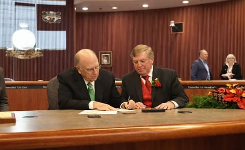 Official land sale signing with President of Cavendish Farms, Robert K. Irving (left) and Lethbridge Mayor Chris Spearman (right). Official land sale signing with President of Cavendish Farms, Robert K. Irving (left) and Lethbridge Mayor Chris Spearman (right).