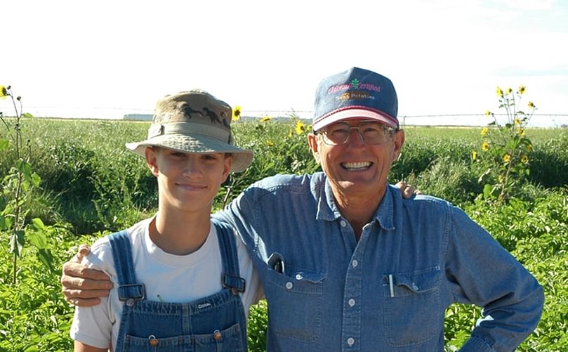 Dr. Charlie Higgins, right, stands with his grandson, Tell Chapman