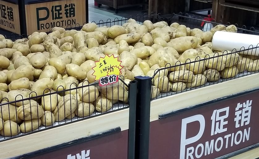 Potato promotion in grocery store in Beijing, China