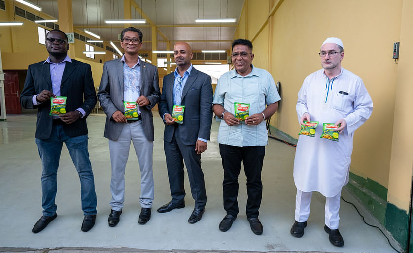 With the newly-launched product, from left, are: Caribe Snackz COO Dwayne Wade, Chairman of the Private Sector Commission Paul Cheong, Caribe Snackz Head Chief Samsair, Minister of Agriculture Zulfikar Mustapha and Sheik Moeen Ul Hack