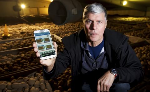 Ray Andrews of Crop Systems with the firm's new web-based potato store controller called SmartStor.
(Courtesy: Mark Bullimore / Eastern Daily Press) Ray Andrews of Crop Systems with the firm's new web-based potato store controller called SmartStor.
(Courtesy: Mark Bullimore / Eastern Daily Press)