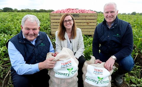 Country Crest owners Michael and Gabriel Hoey with Tesco Ireland's commercial director Sheila Gallagher. Country Crest owners Michael and Gabriel Hoey with Tesco Ireland's commercial director Sheila Gallagher.