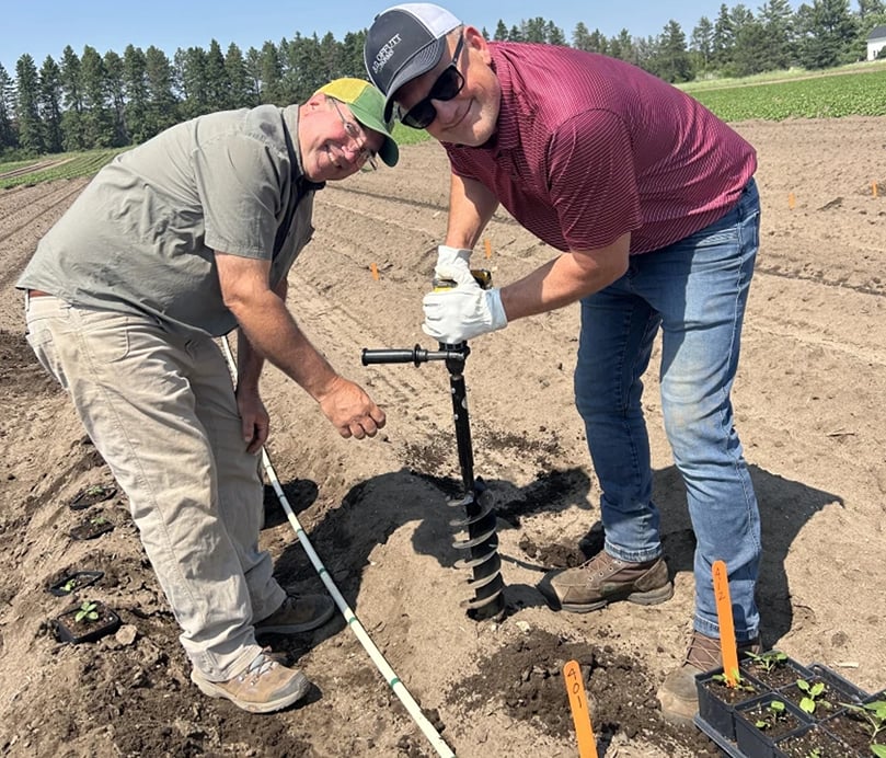RDO Farm Directors Jon Gilley and Joel Steffel installing a research plot at a field in Park Rapids in 2025 RDO Farm Directors Jon Gilley and Joel Steffel installing a research plot at a field in Park Rapids in 2025