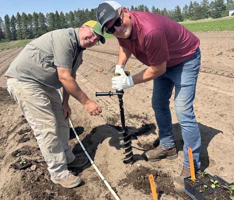 RDO Farm Directors Jon Gilley and Joel Steffel installing a research plot at a field in Park Rapids in 2025 RDO Farm Directors Jon Gilley and Joel Steffel installing a research plot at a field in Park Rapids in 2025