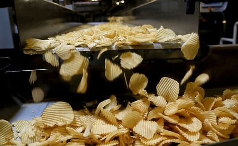 Chips fall off the line at a Shearer's Foods plant in Massillon, Ohio. Courtesy: Lynn Ischay/The Plain Dealer Chips fall off the line at a Shearer's Foods plant in Massillon, Ohio. Courtesy: Lynn Ischay/The Plain Dealer
