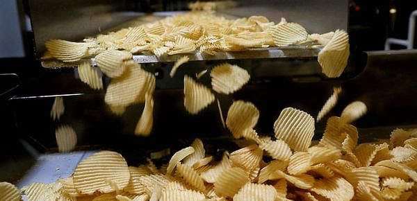 Chips fall off the line at a Shearer's Foods plant in Massillon, Ohio. Courtesy: Lynn Ischay/The Plain Dealer
