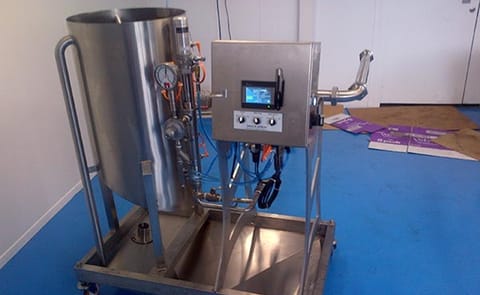 Fabcon Food Systems - Continuous Flow Oil Applicator Fabcon Food Systems - Continuous Flow Oil Applicator