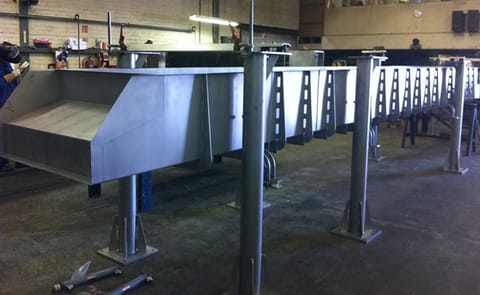 Fabcon Food Systems - H-Motion Horizontal Motion Conveyor Fabcon Food Systems - H-Motion Horizontal Motion Conveyor