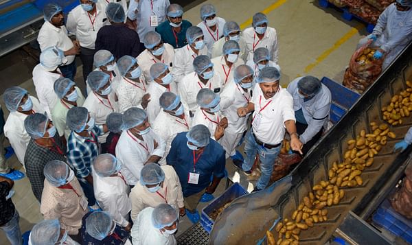 Farmers and stakeholders at Iscon Balaji Foods' Himmatnagar plant, the largest French Fries processing plant in India, participating in a training session as part of the Iscon Balaji Gyan Yatra.