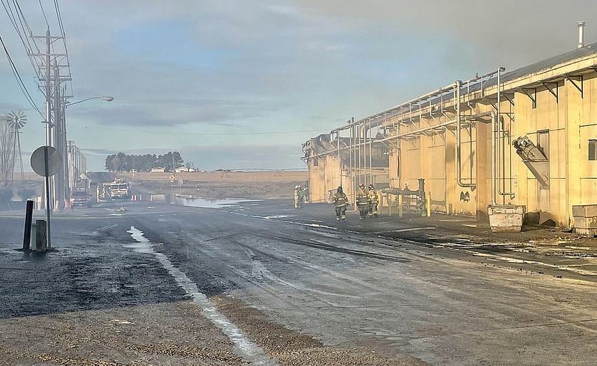 The Washington Potato Co. facility in Warden still smolders the next morning and smoke fills the air after a fire broke out in a potato dehydrator the afternoon of Jan. 21, prompting a response from fire departments across Grant and neighboring Adams coun