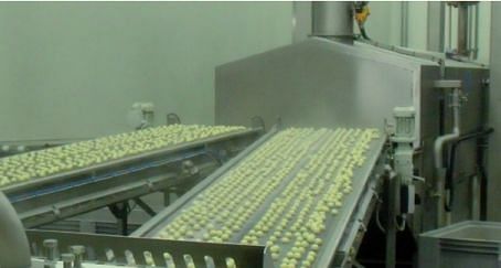 Formed potato specialties right before frying Formed potato specialties right before frying