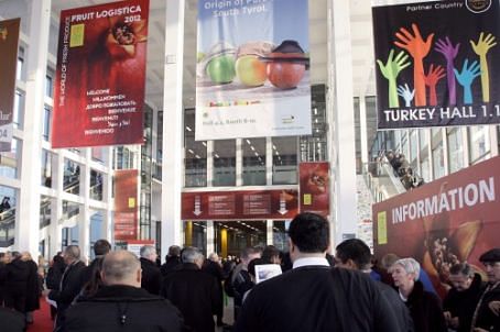 Visitors entering Fruit Logistica 2012. Over 56.000 trade visitors from 130 countries are expected to visit the trade show in Berlin. 