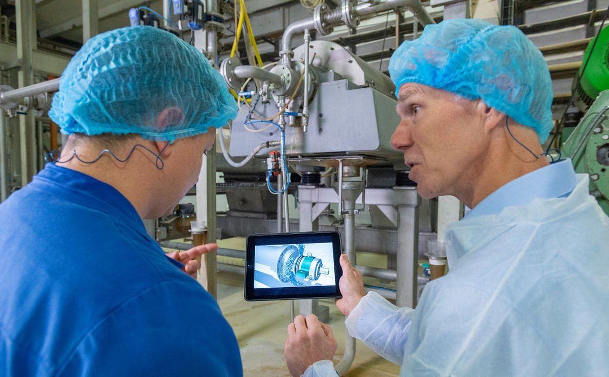 Michel Hörster, Emsland Group (left), and Martin Neugebauer, GEA (right), discuss the decanters for processing potato protein at the plant in Kyritz. The Emsland Group previously chose to partner with GEA in 2018 for the construction of its new protein l