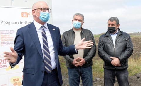 USAID’s Mission Director to Georgia, Peter Wiebler (left), makes a speech at the opening of the cold storage facility located at a new seed model farm in Akhalkalaki. Yurik Unanian (center), the Mayor of Akhalkalaki, and Nair Iritsian (right), the chair USAID’s Mission Director to Georgia, Peter Wiebler (left), makes a speech at the opening of the cold storage facility located at a new seed model farm in Akhalkalaki. Yurik Unanian (center), the Mayor of Akhalkalaki, and Nair Iritsian (right), the chair