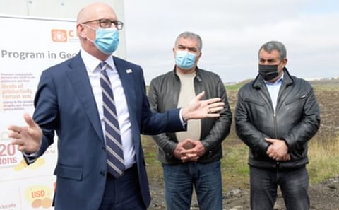 USAID’s Mission Director to Georgia, Peter Wiebler (left), makes a speech at the opening of the cold storage facility located at a new seed model farm in Akhalkalaki. Yurik Unanian (center), the Mayor of Akhalkalaki, and Nair Iritsian (right), the chair USAID’s Mission Director to Georgia, Peter Wiebler (left), makes a speech at the opening of the cold storage facility located at a new seed model farm in Akhalkalaki. Yurik Unanian (center), the Mayor of Akhalkalaki, and Nair Iritsian (right), the chair