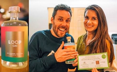 David Côté and Julie Poitras-Saulnier, co-founders of the Montreal company Loop Mission, pose with their latest product — lime-and-ginger gin. (Courtesy: Loop Mission | Facebook)