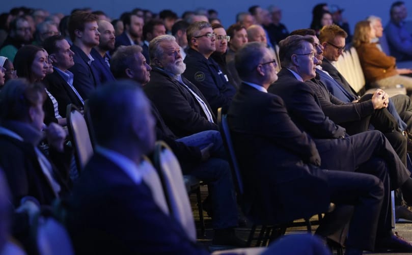 Several hundred people listen to EDC board chairman Shawn Gaddie give remarks at the EDC's annual meeting on Thursday, March 26, 2026, at the Alerus Center.