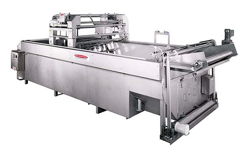 A Heat and Control batch fryer, a typical piece of equipment for the industrial production of kettle style potato chips.