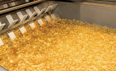 Batch Potato Chips Frying in a Mastermatic LDKF Batch Fryer Batch Potato Chips Frying in a Mastermatic LDKF Batch Fryer
