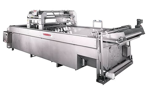 A Heat and Control batch fryer, a typical piece of equipment for the industrial production of kettle style potato chips. A Heat and Control batch fryer, a typical piece of equipment for the industrial production of kettle style potato chips.