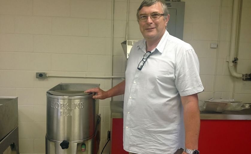 Hopkins CEO Chris Hopkins with one of companies first french fry cutters manufactured on Prince Edward Island (Courtesy: CBC)