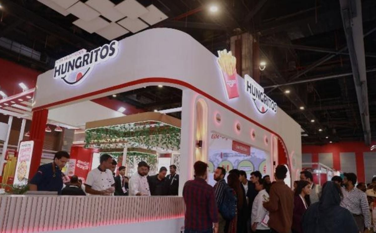 Visitors engage with the Hungritos team at their vibrant booth during World Food India 2025, where the brand showcased its innovative range of frozen snacks and strengthened industry connections under the theme “Building Bonds Through Flavour.” Visitors engage with the Hungritos team at their vibrant booth during World Food India 2025, where the brand showcased its innovative range of frozen snacks and strengthened industry connections under the theme “Building Bonds Through Flavour.”