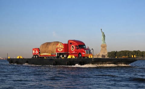 Idaho Potato truck floats past the Statue of Liberty Idaho Potato truck floats past the Statue of Liberty