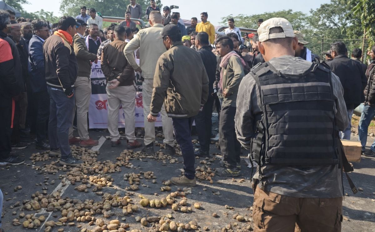 Potato farmers protest on the Sadiya main road in Assam, India, dumping potatoes to demand fair prices and improved market access. Potato farmers protest on the Sadiya main road in Assam, India, dumping potatoes to demand fair prices and improved market access.