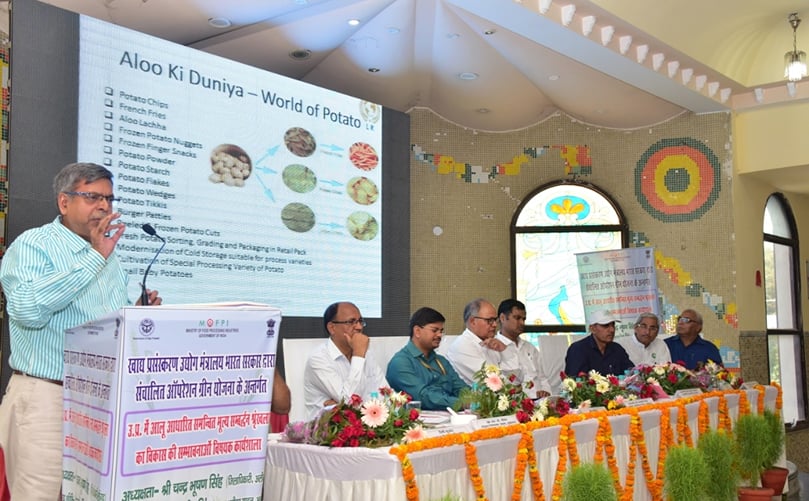 Mr. Dinesh Garg of Leelaram Enterprises addressing an industry knowledge session on potato-based applications, sharing insights on innovations such as the commercial replacement of raw potato with potato flakes in traditional snacks like Aloo Bhujia. Mr. Dinesh Garg of Leelaram Enterprises addressing an industry knowledge session on potato-based applications, sharing insights on innovations such as the commercial replacement of raw potato with potato flakes in traditional snacks like Aloo Bhujia.