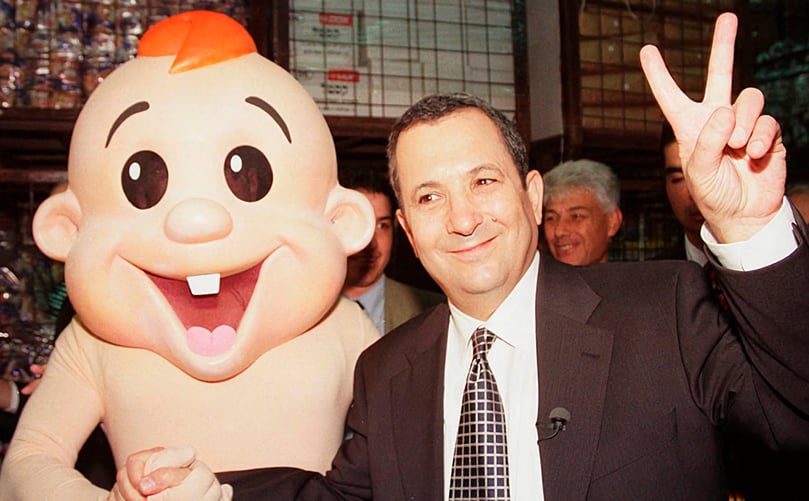 Even Israeli prime ministers are not immune to the power of Bamba (courtesy: Brian Hendler - Getty Images) Even Israeli prime ministers are not immune to the power of Bamba (courtesy: Brian Hendler - Getty Images)