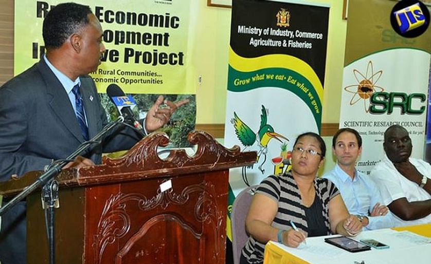 Managing Director at the Jamaica Social Investment Fund (JSIF), Omar Sweeney (at podium), delivers the keynote address at the launch of a $19-million programme to boost Jamaica’s capacity to produce clean Irish potato seedlings, on August 15 at the Scie