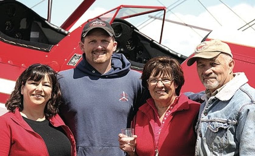 James Hoff (second from left) and Bob Hoff with their wives, Darla and Jane (Courtesy of the Hoff family)