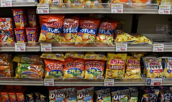Bags of Calbee chips at a supermarket in Tokyo in July 2021.