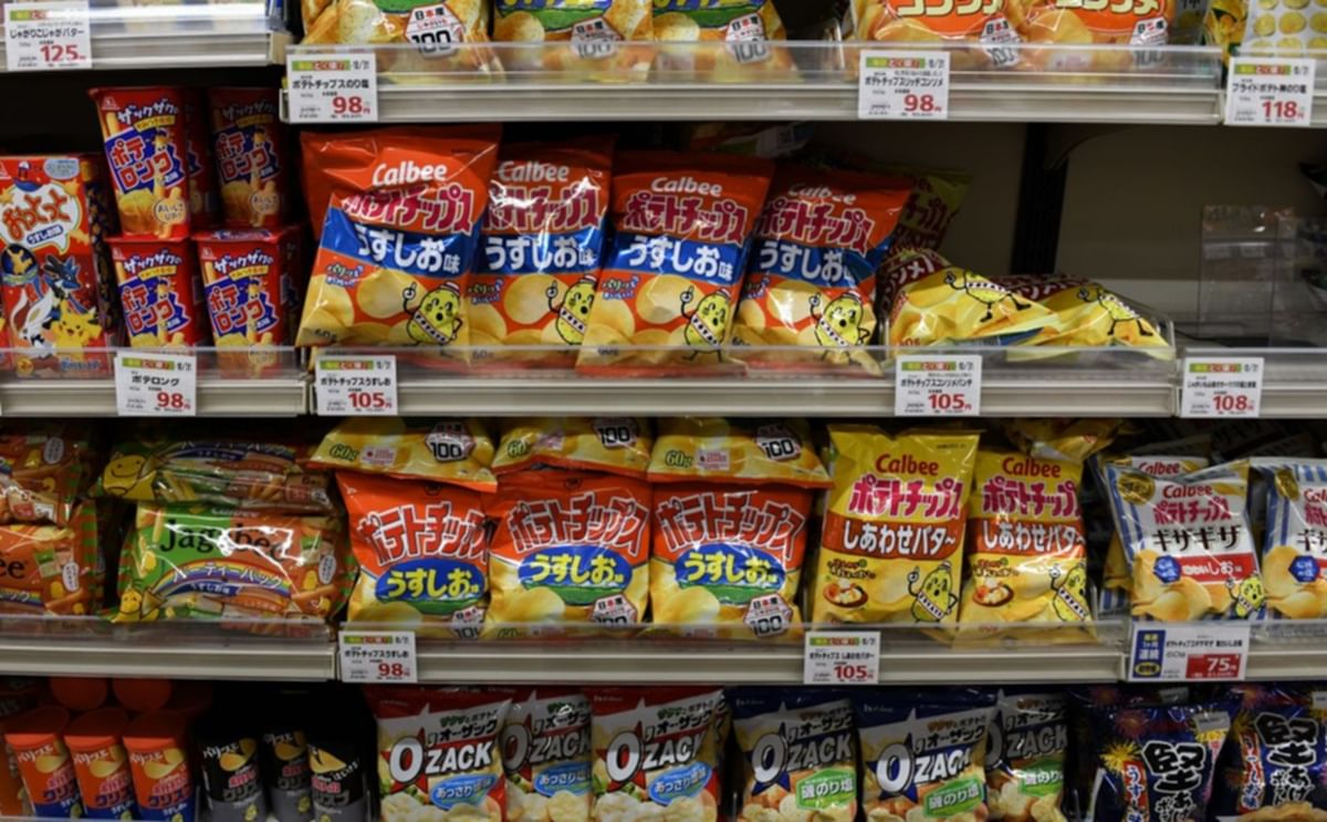 Bags of Calbee chips at a supermarket in Tokyo in July 2021.