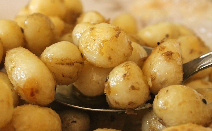Jersey Royal potatoes, lightly boiled, paper-thin skins on, then sautéd in butter (Courtesy: MsMarmiteLover). Jersey Royal potatoes, lightly boiled, paper-thin skins on, then sautéd in butter (Courtesy: MsMarmiteLover).