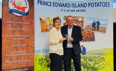 Award presented to the late Kevin McKenna’s family, L-R: Donald Stavert, PEI Potato Board Chair, Nolan McKenna, Linda McKenna, Caitlin McKenna, and Grant Compton, presenter of the award Award presented to the late Kevin McKenna’s family, L-R: Donald Stavert, PEI Potato Board Chair, Nolan McKenna, Linda McKenna, Caitlin McKenna, and Grant Compton, presenter of the award