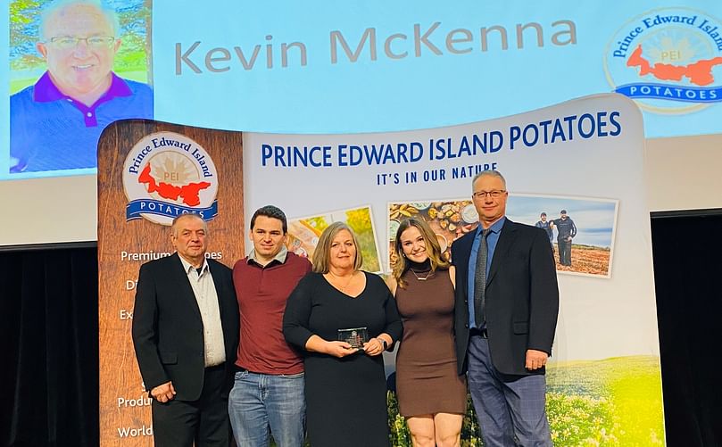 Award presented to the late Kevin McKenna’s family, L-R: Donald Stavert, PEI Potato Board Chair, Nolan McKenna, Linda McKenna, Caitlin McKenna, and Grant Compton, presenter of the award