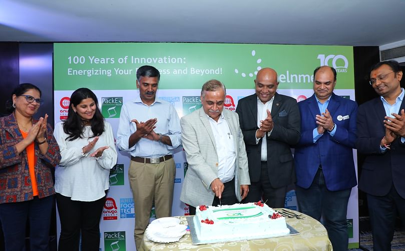 Koelnmesse Pvt Ltd Managing Director Milind Dixit cuts the cake to celebrate 100 years of Koelnmesse GmbH at the Partners Forum 2024, marking a century of excellence in organizing global trade fairs